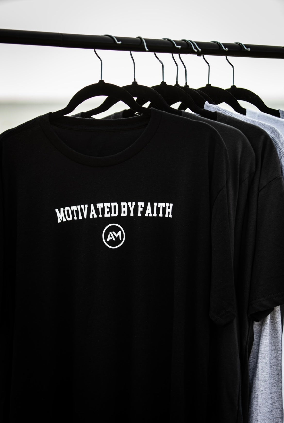 Motivated by Faith Tee